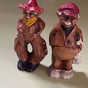 Lot of two vintage hand carved wooded figurines.cowboy golfer